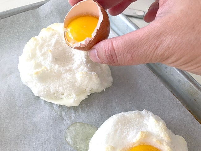 Pouring Egg yolk onto egg whites